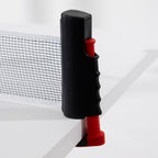 Close-up of the Play the Field Table Tennis Set adjustable net post clamped securely to the edge of a table.