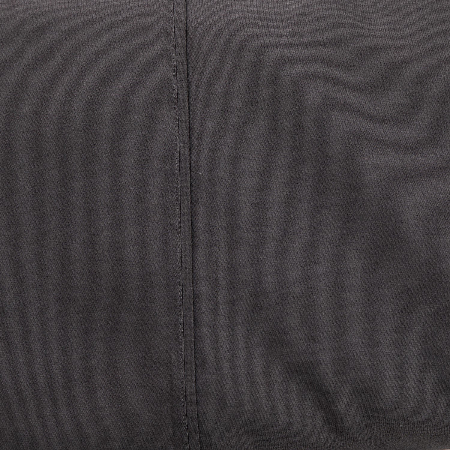 Close-up of dark gray fabric with a visible seam