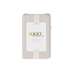 A beautifully packaged 1000 thread count cotton body pillowcase is presented with a reusable branded storage band and elegant sleeve, reflecting timeless luxury and thoughtful design.