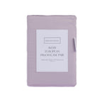 A pair of Gracious Living Avery 750TC 100% Cotton European Pillowcases in Dusky Mauve, featuring soft lavender-purple cotton sateen fabric and a smooth finish, styled on a bed with coordinating bedding against a neutral upholstered headboard.