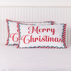 Christmas Wishes Merry Christmas Pillowcase Pair featuring bold red festive lettering on a white background, framed by a teal scalloped border and red and white candy cane stripes.