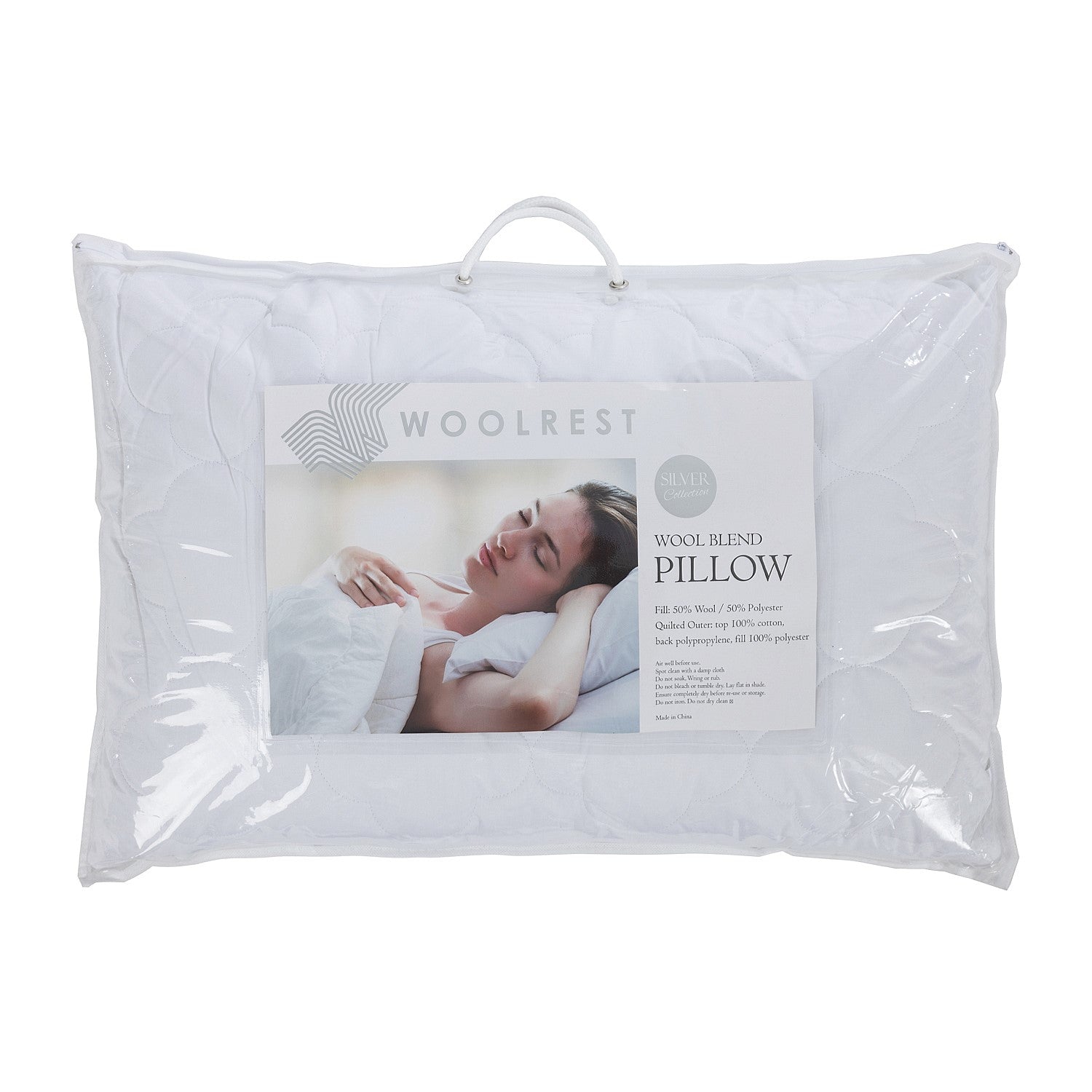 Woolrest Wool Blend Pillow packaged in a clear carry bag, featuring a wool-rich blend fill and quilted cover designed to provide breathable comfort and everyday support.
