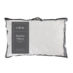 Eden Bobble Pillow in a reusable zippered carry bag with carry handle, featuring a grey product label and soft white bobble-textured cover.
