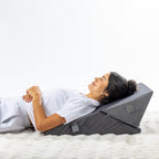 Solace Multi-Purpose Wedge Support Pillow configured into an angled backrest for comfortable reclining.