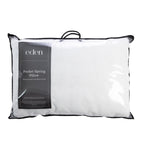 Eden Pocket Spring Pillow in white, presented in its clear carry bag packaging with black trim and handles.