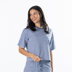 Woman wearing the Simple & Sunday Lounge Relaxed Stripe Tee in Faded Blue with matching lounge pants.