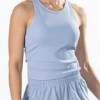 Close-up of the Faded Blue Simple & Sunday Lounge Weekend Ribbed Tank Top showcasing the ribbed fabric and fitted silhouette.