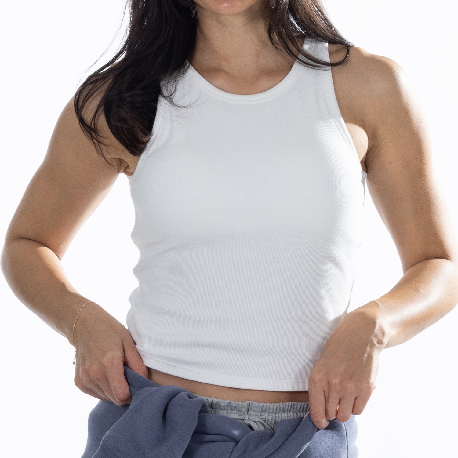 Close-up front view of the White Simple & Sunday Lounge Weekend Ribbed Tank Top showcasing the ribbed fabric and fitted silhouette.