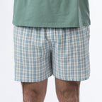 Close-up of the Design Plus Men’s Check PJ Set Blue shorts, showing the blue, white and grey check pattern.