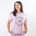 A soft pink sleep tee features a playful heart graphic with the words "L'Amour Est Déclaré," creating a sweet, feminine look that's perfect for cosy nights and relaxed mornings.