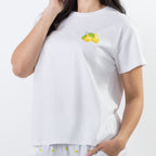 Close-up of the bb&b Sleep Limoncello Print Sleep Tee in White, highlighting the small yellow and green lemon motif on the chest.