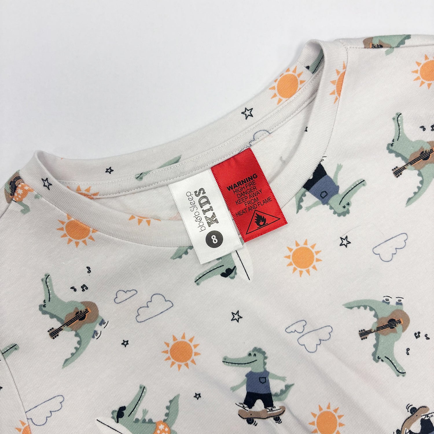Close up of tags on the after a while crocodile PJ  Set.