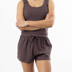 Design Republique Ribbed Shorts in Chocolate shown with the matching ribbed singlet in a relaxed studio pose.
