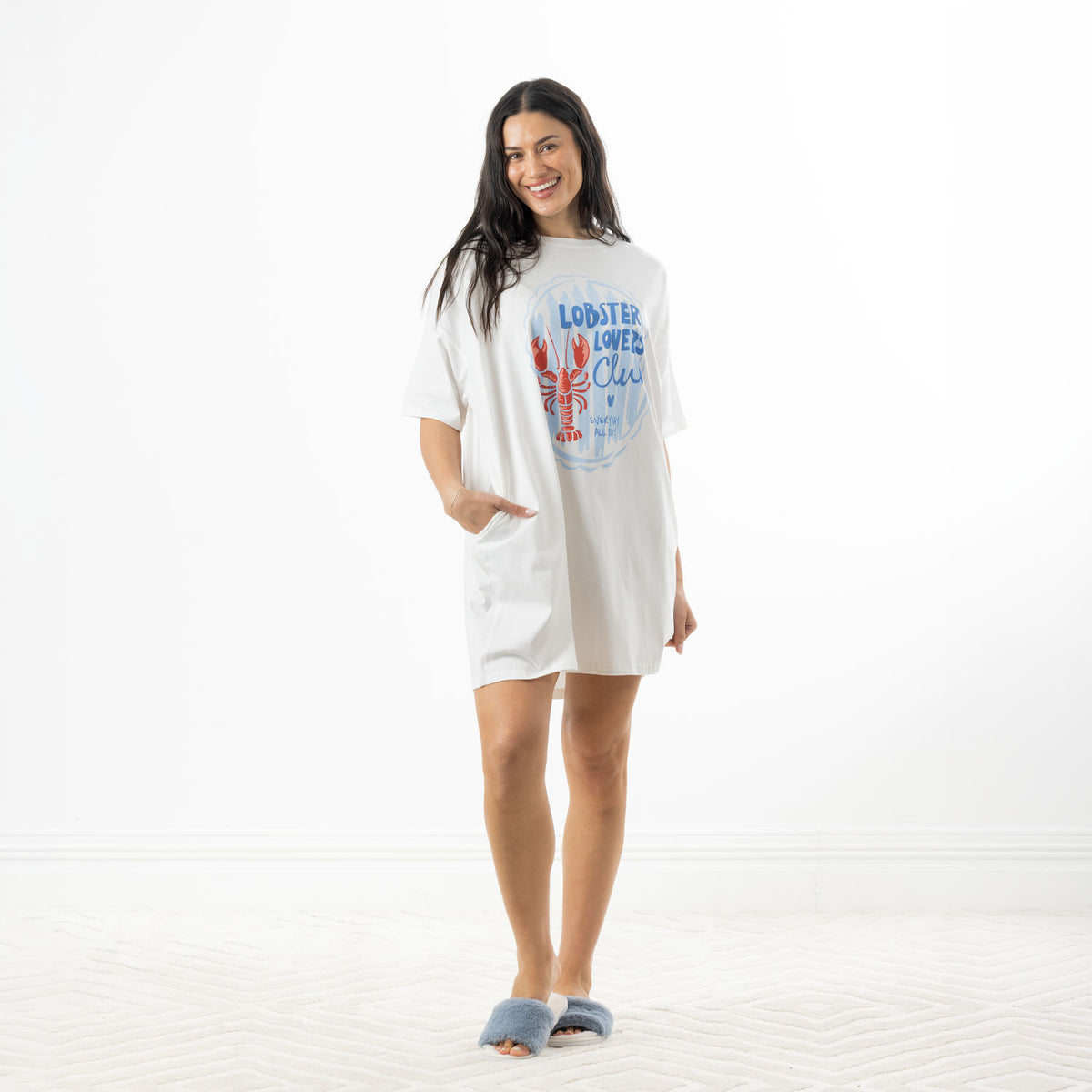 Full-length front view of the white oversized sleep tee with Lobster Lovers Club graphic, short sleeves and relaxed fit.