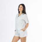 Side view of the Amparo Sophie Stripe PJ Set in Blue, showing the relaxed short-sleeve top and matching shorts.
