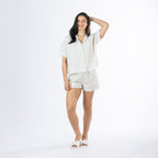 Full-length view of the Amparo Sophie Stripe PJ Set in Natural, showing the relaxed fit of the matching top and shorts.
