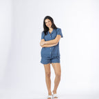Model posing with folded arms in the Gracious Living Olivia Embroidered Short PJ Set in navy, featuring a button-front top and matching embroidered shorts.