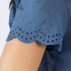Close-up of the Gracious Living Olivia Embroidered Short PJ Set in navy, highlighting the delicate eyelet embroidery and scalloped edge of the short sleeve.