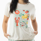 Close-up of the off-white bb&b Sleep Lobster Print Sleep Tee showing colourful lobster, fish, tomato, lemon and seashell illustrations.
