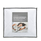 Solace Reversible Waterproof Mattress Protector packaging displayed in a reusable storage bag with product details and lifestyle imagery.