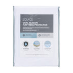 Packaged Solace Dual Season Mattress Protector in white, featuring product information for its reversible cool-touch and cosy coral fleece sides, waterproof protection and elasticated skirt.