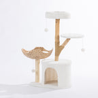 Angled view of the cream cat tower featuring a plush hideaway, woven basket bed, elevated perch, natural wood-look scratching post, and dangling pom-pom toys.