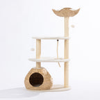 Natural woven cat tower with a plush top basket, sisal scratching posts, woven hideaway, plush platforms, hanging pom-pom toys, and climbing rope displayed on a white background.