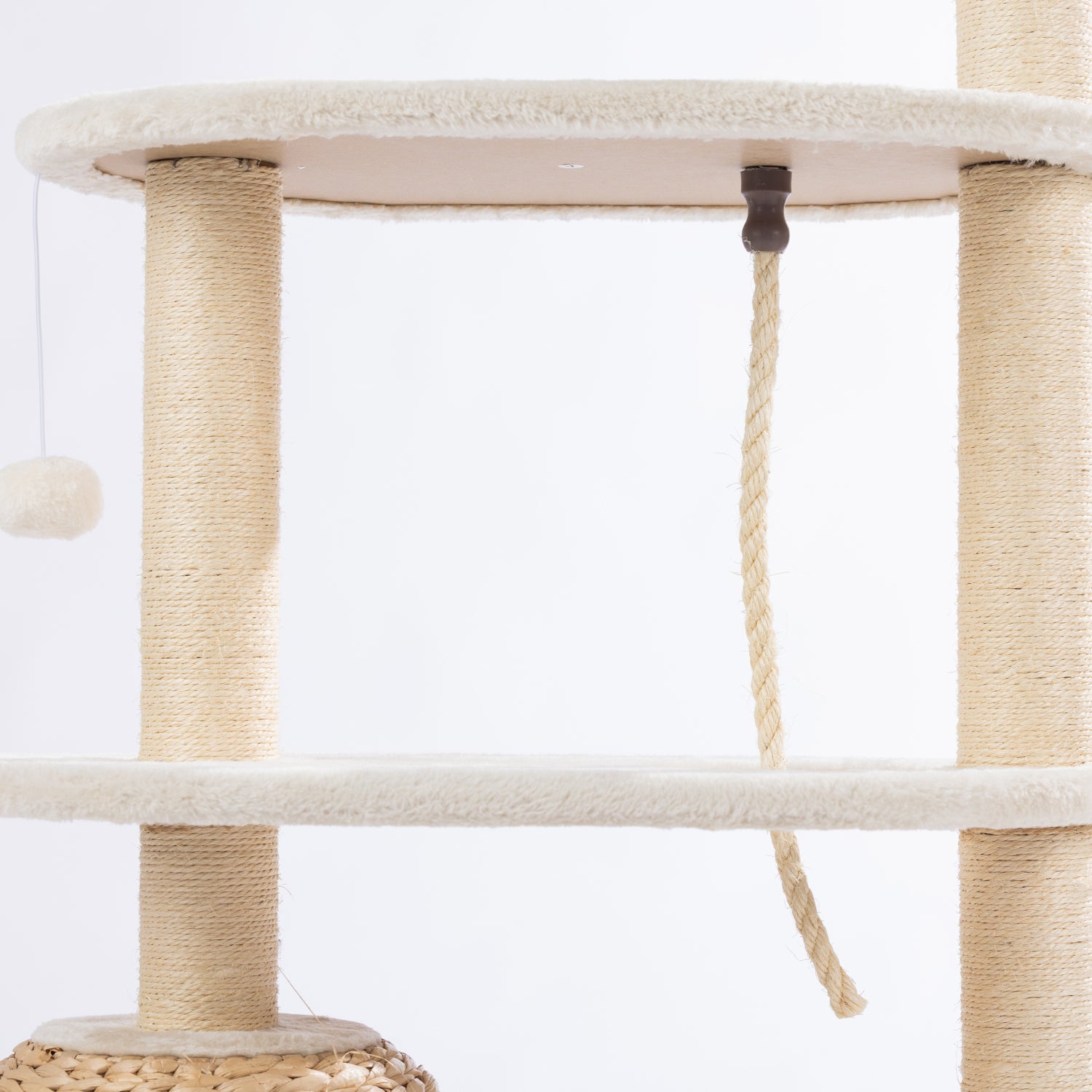 Close-up of the centre platforms showing the sisal scratching posts, hanging climbing rope, and plush finish.