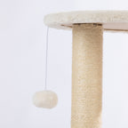 Close-up of the plush hanging pom-pom toy attached beneath the upper platform of the natural woven cat tower.
