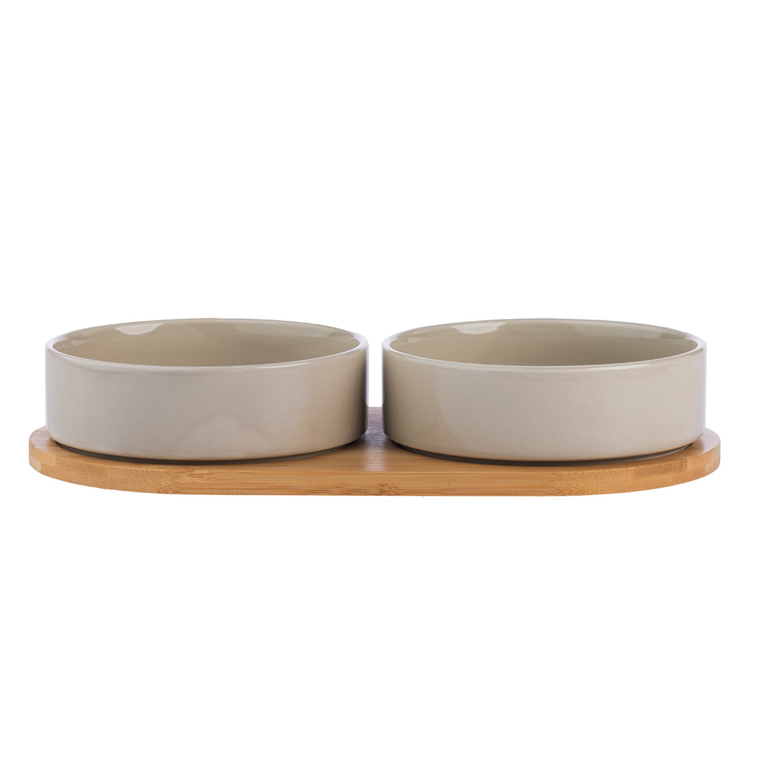 Two mushroom-coloured ceramic pet bowls displayed on a natural bamboo holder.