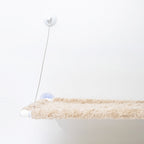 A close up of a cat hammock