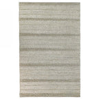Textured area rug with a striped pattern on a white background
