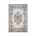 Cream soft ribbed rug with colourful floral border and centre design on a white background.