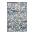 Home Co. Soft Ribbed Everly Rug (160 × 230cm) in Denim, featuring a subtle floral vine pattern in soft denim blue and ivory with a textured ribbed finish.