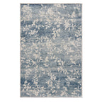 Home Co. Soft Ribbed Everly Rug (200 × 300cm) in Denim, featuring a subtle floral vine pattern in soft denim blue and ivory with a textured ribbed finish.