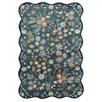 Home Co. Ribbed Scallop Everly Rug (200 × 300cm) in Teal, featuring a scalloped edge and an all-over floral botanical print in soft cream, blush, mustard and peach tones with a textured ribbed finish.