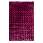 Berry faux fur area rug with a plush, textured finish and soft wavy pile.