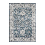 Design Republique Vali Border Chenille Rug (160 × 230cm) in Blue, featuring a distressed vintage-inspired floral medallion design in soft blue, ivory, and grey tones with an ornate decorative border.