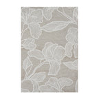 Biscotti-toned wool rug featuring oversized ivory floral outlines with a textured botanical design on a soft neutral background.