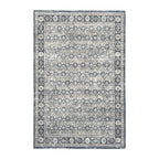 Design Republique Dexy Border Rug in Charcoal with a distressed geometric pattern and dark border.
