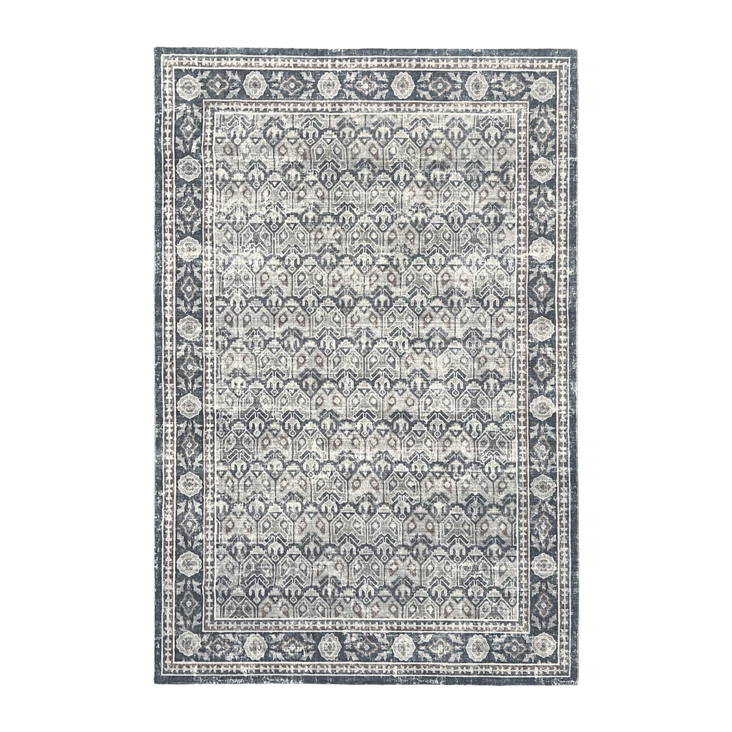 Design Republique Dexy Border Rug in Charcoal with a distressed geometric pattern and dark border.