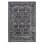 A rectangular traditional area rug with an intricate floral and geometric pattern in navy blue, beige, and muted teal, shown flat against a solid white background.