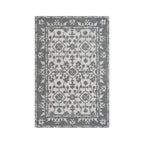 Design Republique Ari Area Rug 120 x 180cm in Silver, featuring a grey and ivory traditional floral pattern with a decorative border.