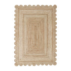 Natural rectangular jute rug featuring a textured woven design, concentric rectangular pattern and decorative scalloped edges.