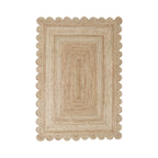Natural rectangular jute rug featuring a textured woven design, concentric rectangular pattern and decorative scalloped edges.