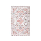 Home Co. Amelia Scatter Clay Floral Rug featuring a distressed vintage-inspired pattern in soft clay, cream and brown tones.