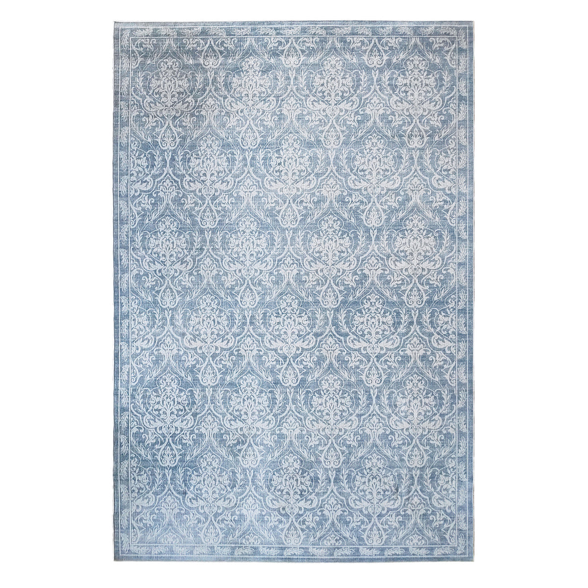 A soft blue textured rug featuring an all-over ornate floral damask pattern in white with a delicate decorative border against a white background.
