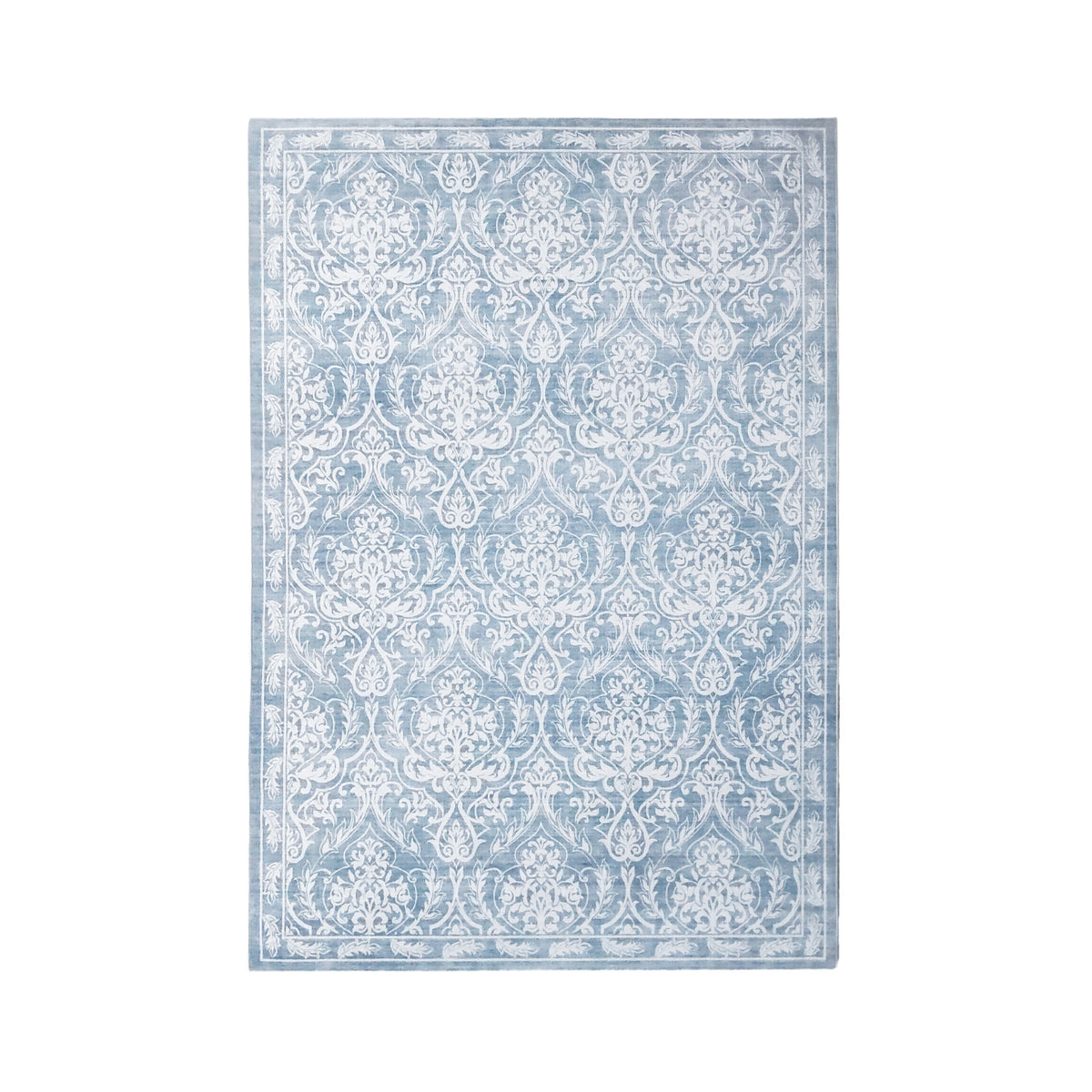 Soft blue rectangular rug featuring an intricate white damask floral pattern with a decorative border, 120 x 180cm.