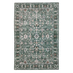 A green textured rug featuring an intricate vintage-inspired floral pattern in cream and muted earthy tones, framed by a decorative border against a white background.