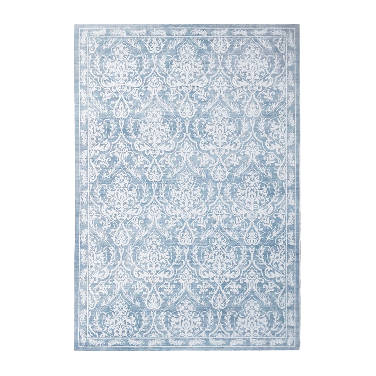 Soft blue rectangular rug featuring an intricate white damask floral pattern with a decorative border, 160 x 230cm.